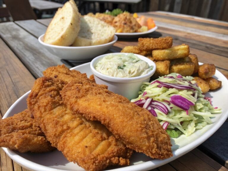 Golden crispy Hillbilly Fish Fry Seasoning served with Southern sides