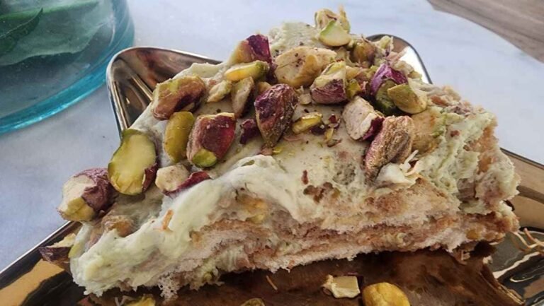 A delicious and creamy pistachio tiramisu with layers of pistachio cream and coffee-soaked ladyfingers